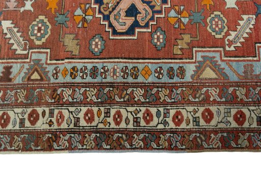 Full view of 1930s Heriz rug from Iran / Persia, 186 × 144 cm in Red tones