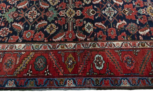 Close-up detail of 1930s Heriz rug from Iran / Persia showing Wool weave