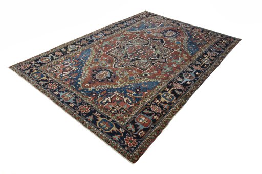 Corner detail of 1930s Heriz rug showing border pattern and Wool pile