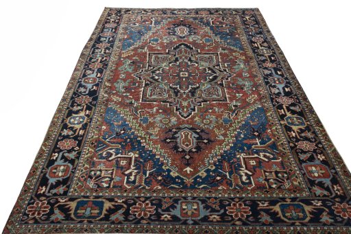 Surface texture of 1930s Heriz rug with natural Wool and intricate pattern