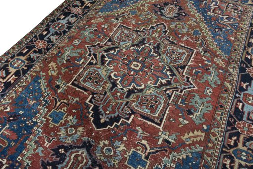 Backside of handmade 1930s Heriz rug showing knot structure and weave density