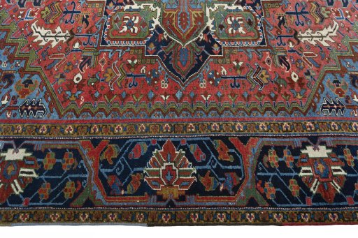 Corner detail of 1930s Heriz rug showing border pattern and Wool pile