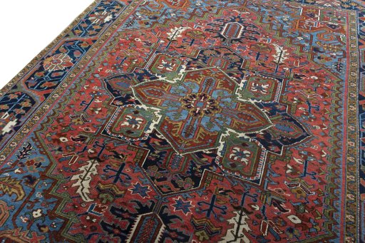 Backside of handmade 1930s Heriz rug showing knot structure and weave density