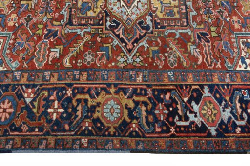 Corner detail of 1930s Heriz rug showing border pattern and Wool pile