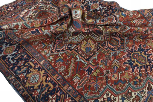 Surface texture of 1930s Heriz rug with natural Wool and intricate pattern