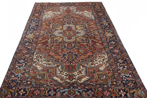 Surface texture of 1930s Heriz rug with natural Wool and intricate pattern