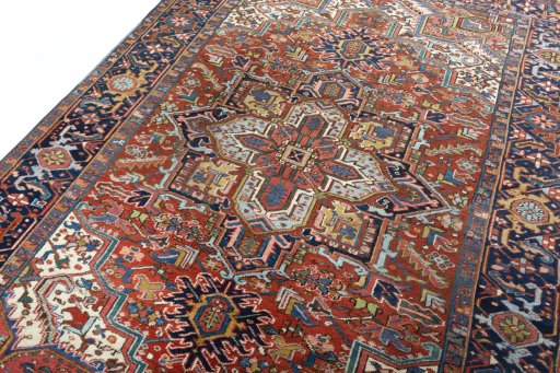 Backside of handmade 1930s Heriz rug showing knot structure and weave density