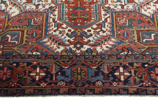 Full view of 1930s Heriz rug from Iran / Persia, 325 × 220 cm in Red tones