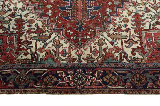 Full view of 1930s Heriz rug from Iran / Persia, 355 × 262 cm in Red tones