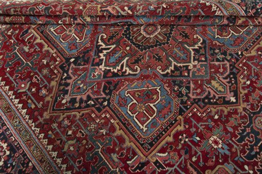 Close-up detail of 1930s Heriz rug from Iran / Persia showing Wool weave