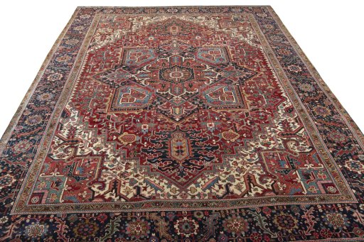 Surface texture of 1930s Heriz rug with natural Wool and intricate pattern