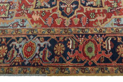 Corner detail of 1930s Heriz rug showing border pattern and Wool pile