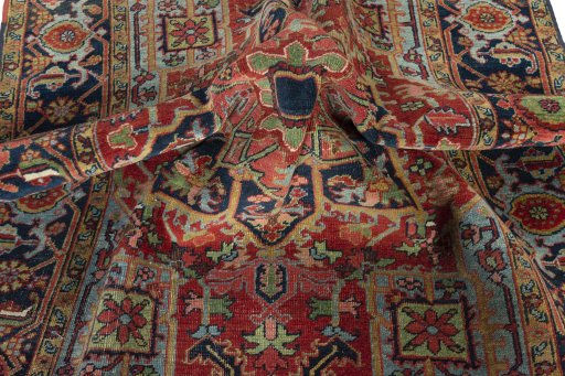 Surface texture of 1930s Heriz rug with natural Wool and intricate pattern