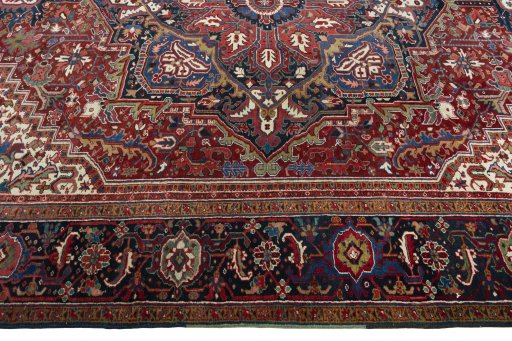 Corner detail of 1930s Heriz rug showing border pattern and Wool pile