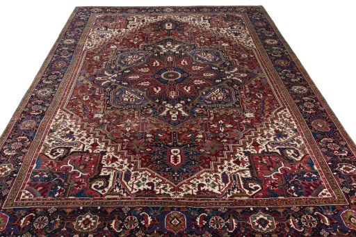 Surface texture of 1930s Heriz rug with natural Wool and intricate pattern