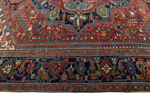 Corner detail of 1930s Heriz rug showing border pattern and Wool pile