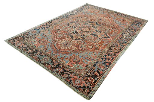 Corner detail of 1930s Heriz rug showing border pattern and Wool pile
