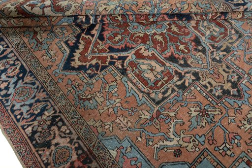 Surface texture of 1930s Heriz rug with natural Wool and intricate pattern