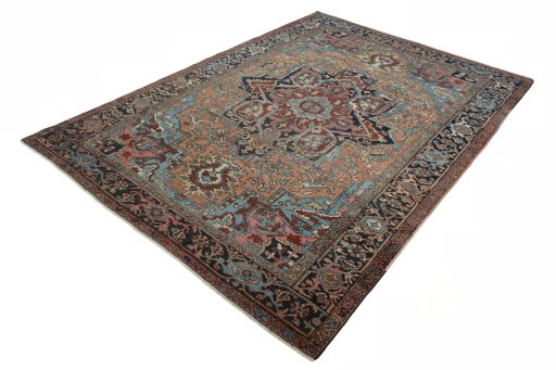 Corner detail of 1930s Heriz rug showing border pattern and Wool pile