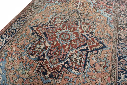 Backside of handmade 1930s Heriz rug showing knot structure and weave density