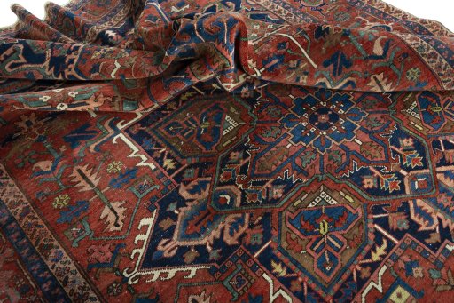 Surface texture of 1930s Heriz rug with natural Wool and intricate pattern