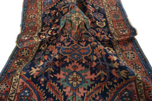 Surface texture of 1930s Heriz rug with natural Wool and intricate pattern