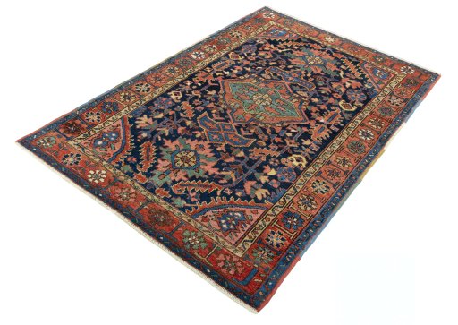 Corner detail of 1930s Heriz rug showing border pattern and Wool pile