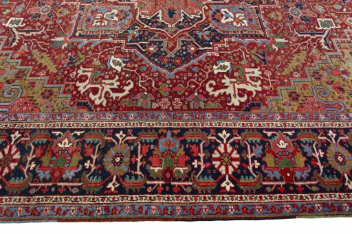 Corner detail of 1930s Heriz rug showing border pattern and Wool pile