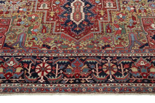 Full view of 1930s Heriz rug from Iran / Persia, 412 × 310 cm in Red tones