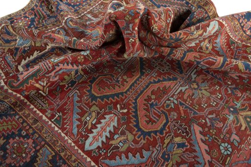 Surface texture of 1930s Heriz rug with natural Wool and intricate pattern