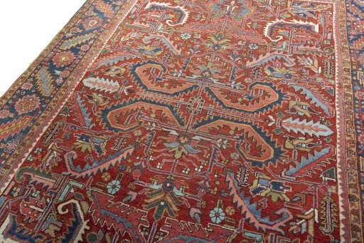 Backside of handmade 1930s Heriz rug showing knot structure and weave density