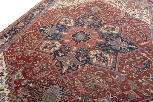 Backside of handmade 1930s Heriz rug showing knot structure and weave density