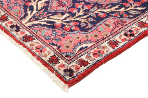 Backside of handmade 1920s Heriz rug showing knot structure and weave density