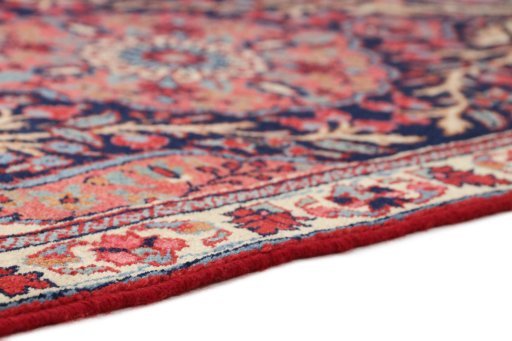 Backside of handmade 1920s Heriz rug showing knot structure and weave density