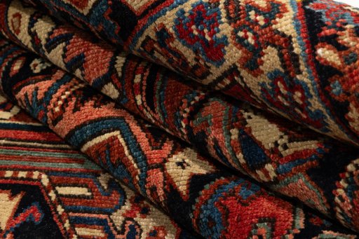 Surface texture of 1990s Heriz rug with natural Wool and intricate pattern