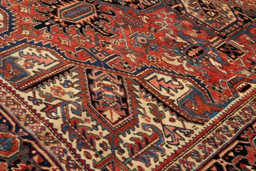 Backside of handmade 1990s Heriz rug showing knot structure and weave density