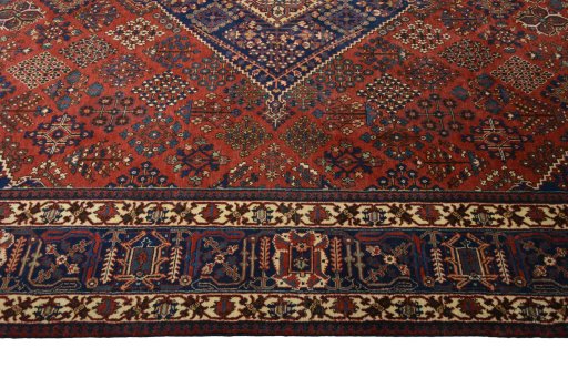 Corner detail of 1970s Joshagan rug showing border pattern and Wool pile