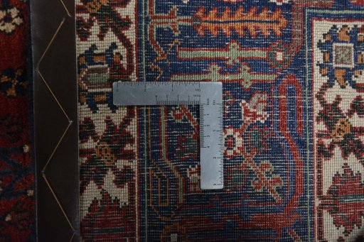 Backside of handmade 1970s Joshagan rug showing knot structure and weave density