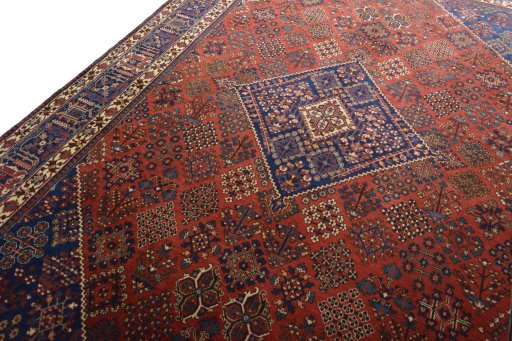 Backside of handmade 1970s Joshagan rug showing knot structure and weave density