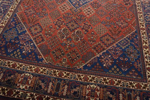 Close-up detail of 1970s Joshagan rug from Iran / Persia showing Wool weave