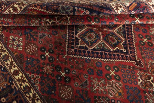 Close-up detail of 2000s Joshagan rug from Iran / Persia showing Wool weave