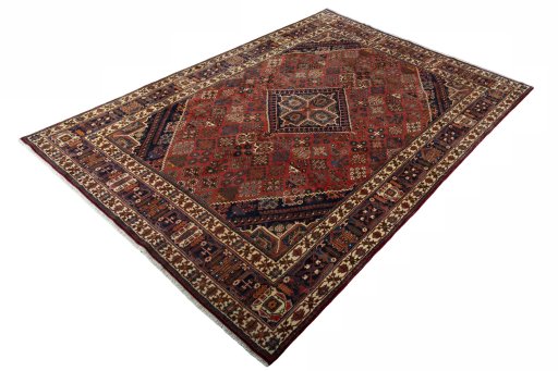 Corner detail of 2000s Joshagan rug showing border pattern and Wool pile