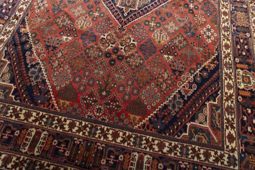 Close-up detail of 2000s Joshagan rug from Iran / Persia showing Wool weave