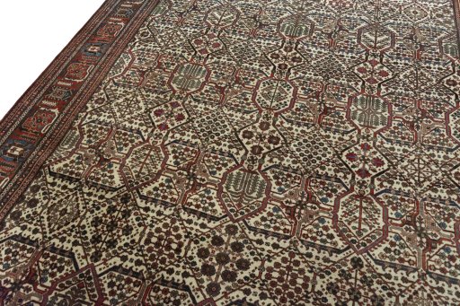 Backside of handmade 1950s Joshagan rug showing knot structure and weave density