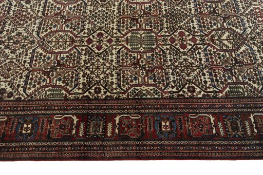 Close-up detail of 1950s Joshagan rug from Iran / Persia showing Wool weave
