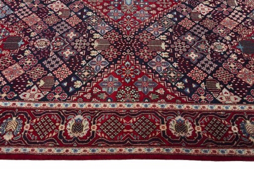 Corner detail of 2000s Joshagan rug showing border pattern and Wool pile
