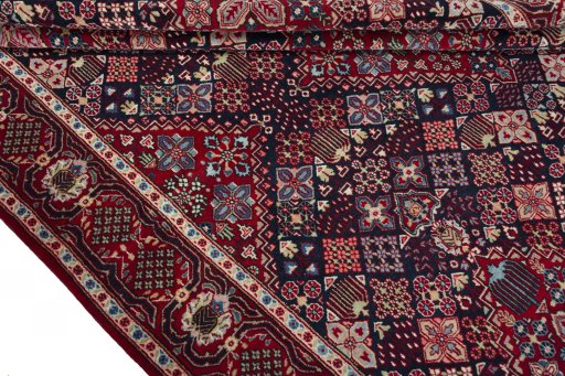 Close-up detail of 2000s Joshagan rug from Iran / Persia showing Wool weave