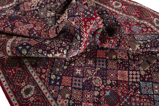 Surface texture of 2000s Joshagan rug with natural Wool and intricate pattern