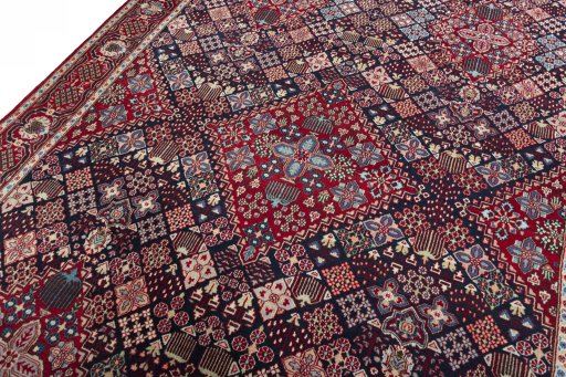 Backside of handmade 2000s Joshagan rug showing knot structure and weave density
