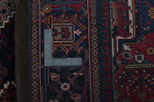 Backside of handmade 1970s Joshagan rug showing knot structure and weave density